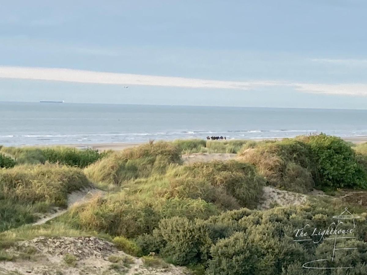 Appartement The Lighthouse De Haan Bagian luar foto